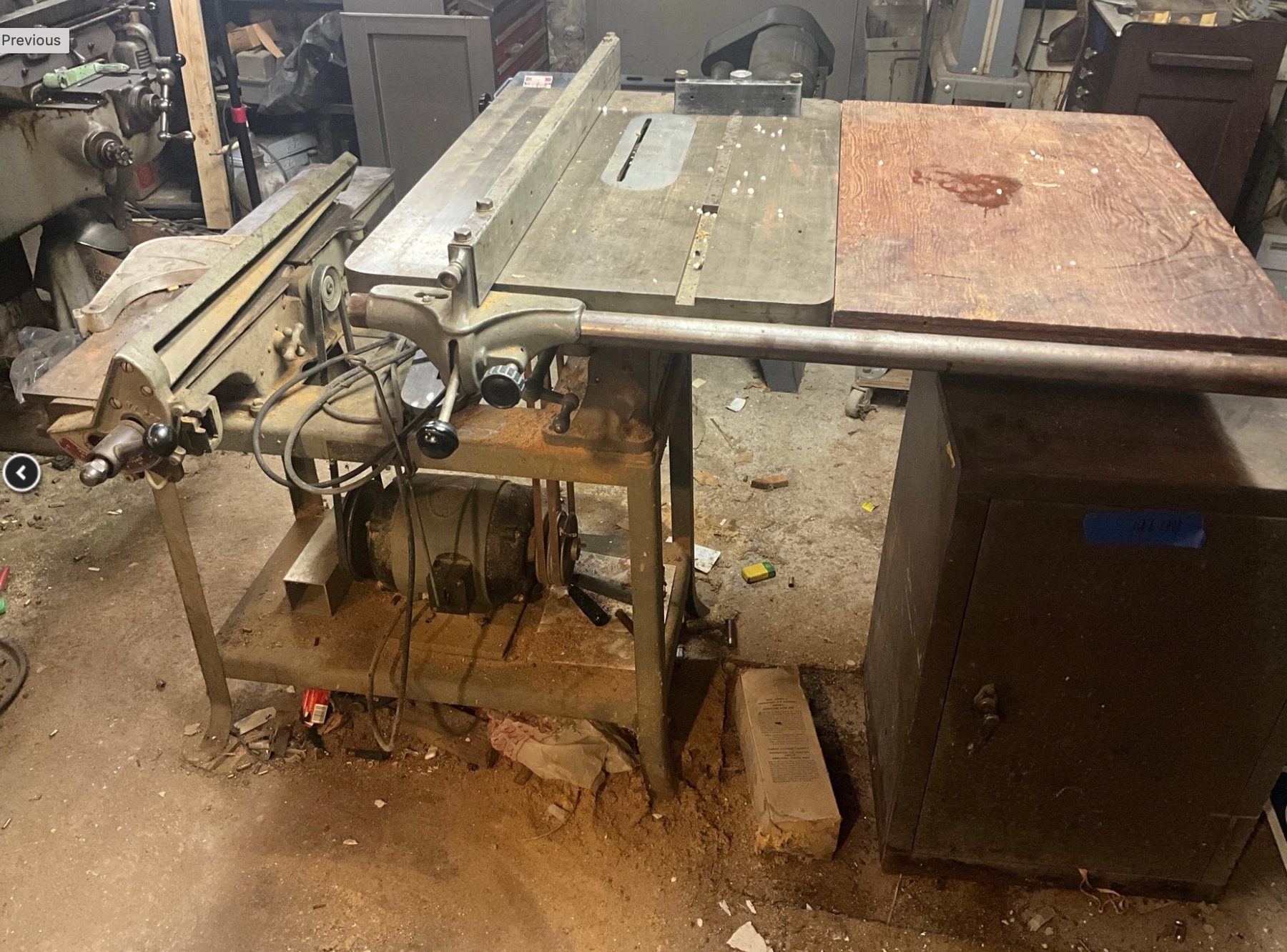 The saw as found, covered in sawdust and grime