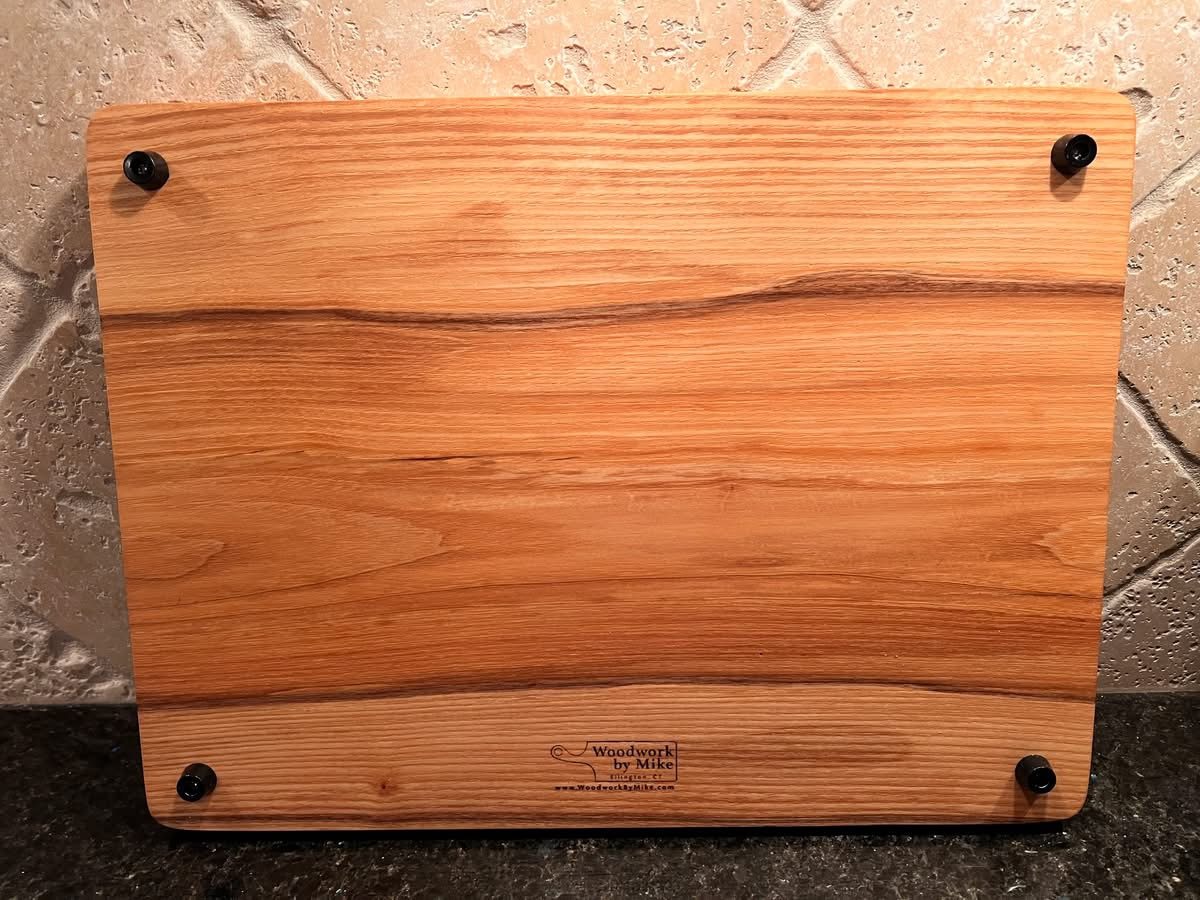 Back of the ash board with rubber feet and the Woodwork By Mike brand