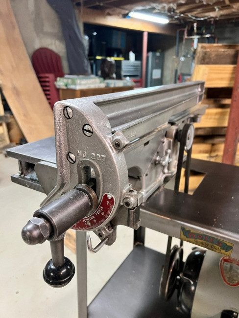 The restored jointer fence with its original red depth plate