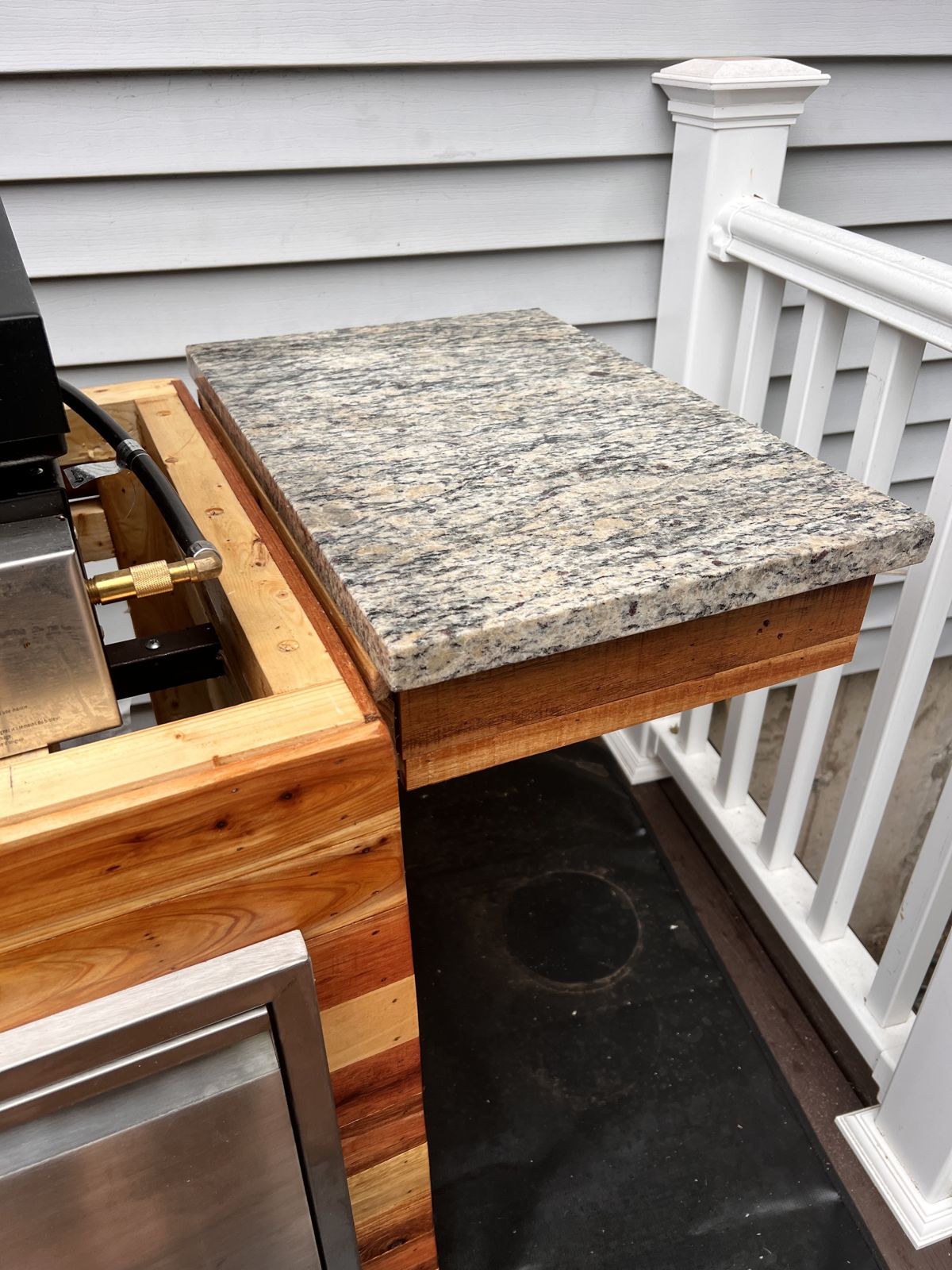 Folding granite side shelf