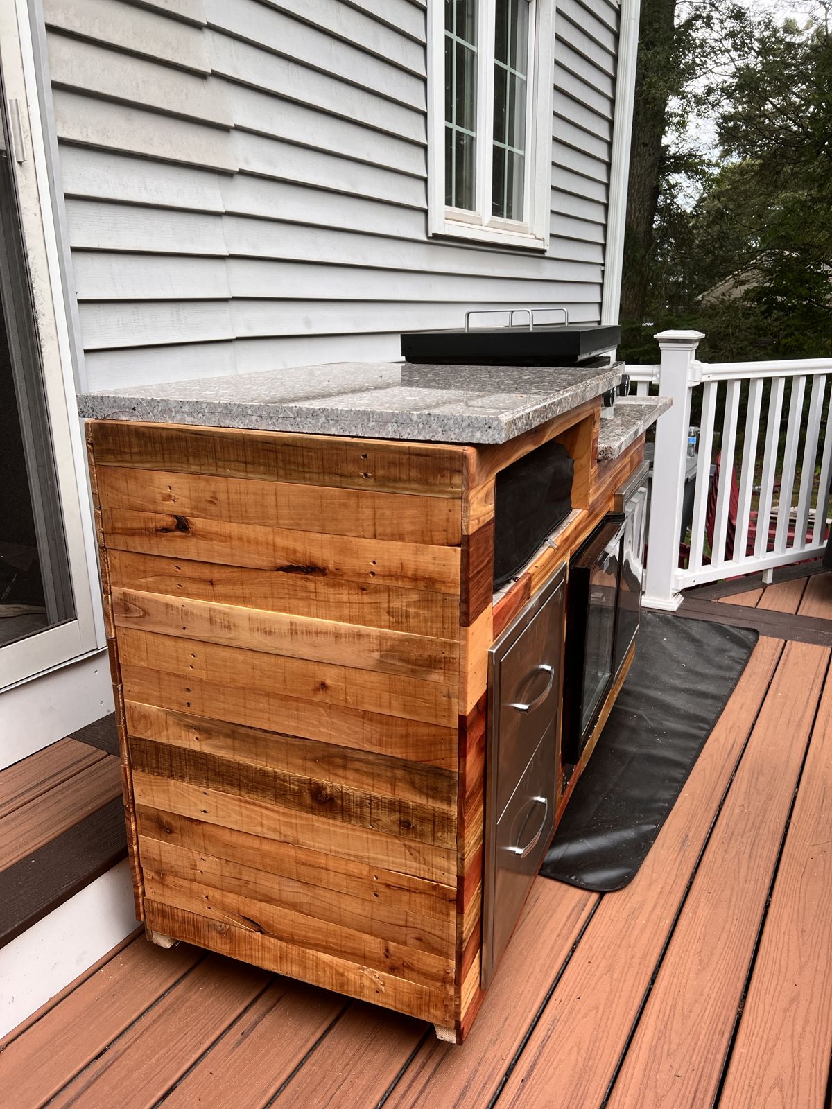 The finished grill cart on the deck